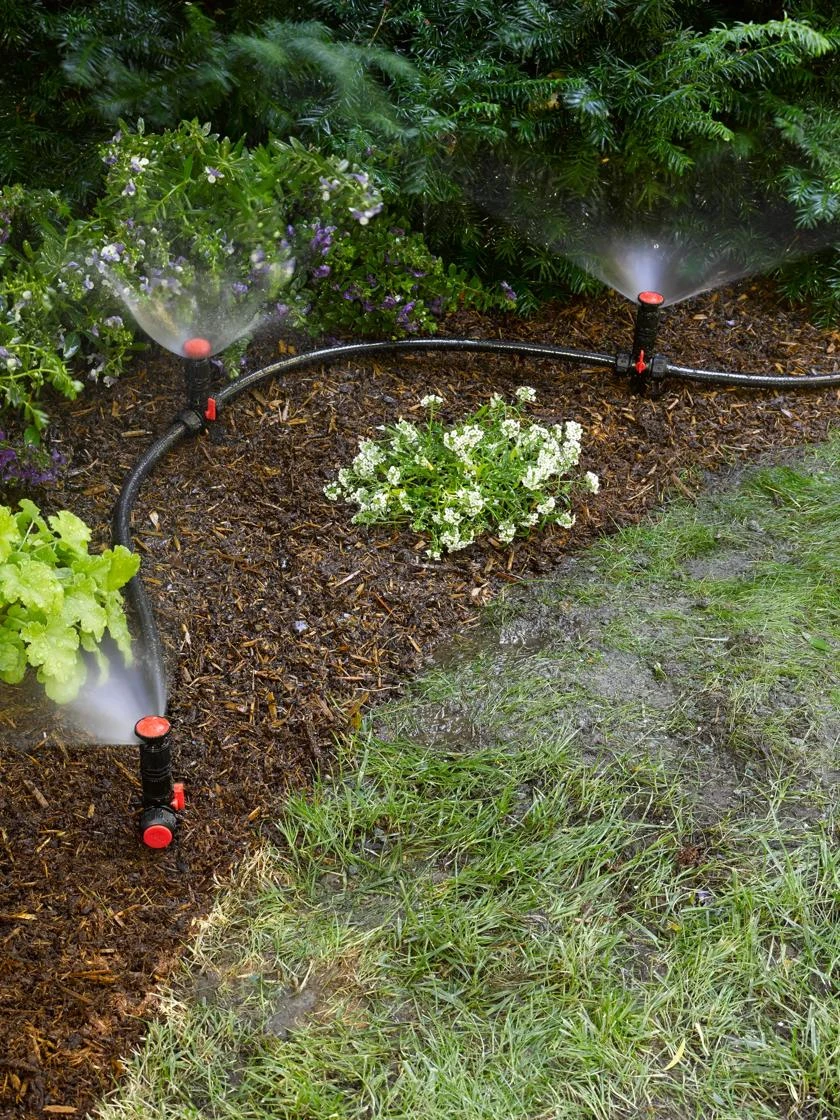 Snip-n-Spray sprinkler system in garden
